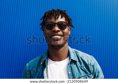 Image, Stock Photo Trendy black man on smartphone in city