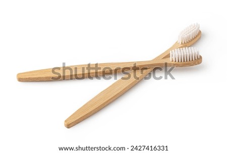 Similar – Image, Stock Photo Wooden toothbrushes with dental floss.