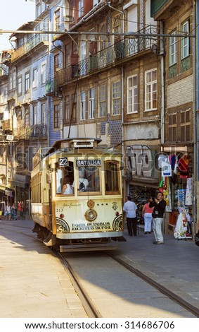 PORTUGAL, PORTO - SEPTEMBER 7: the old historical tram on on port streets on September 7, 2015.
