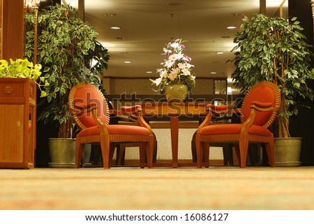 two classic armchairs  with a side table