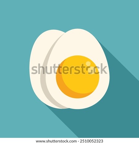 Minimalist flat lay image of a sliced hard boiled egg showing the yolk, isolated on a blue background with a long shadow