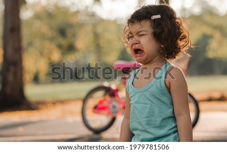 Similar – Image, Stock Photo Little girl is crying.