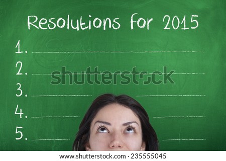 Resolutions for 2015 / New Year Goals List on Blackboard with Girl
