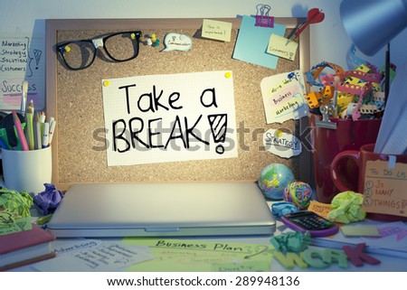 Take a break note on bulletin board in office / Overloaded worker needs break or day off concept