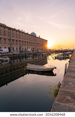 Sunset over Canal Grande di Trieste with beautiful buildings and refletion on the water. Stock fotó © 