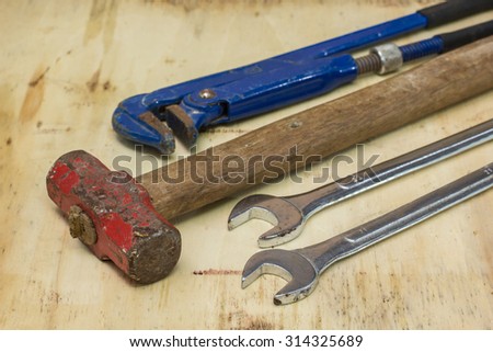 tools renovation on wooden background
