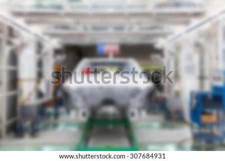 blurry background of paint room for car in car factory