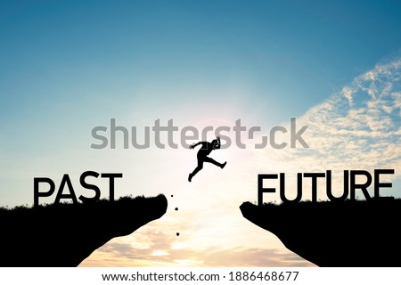 Go ahead and continuously improvement concept, silhouette man jump on a cliff from past to future with cloud sky background.