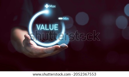 Businessman holding virtual download icon progress for increasing value added to business product and service concept. Foto stock © 