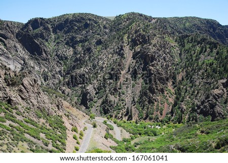 Overlook on East Portal Road over East Portal, in Black canyon of the Gunnison National Park, CO, USA. This extremely steep road has hairpin curves and 16% grades.