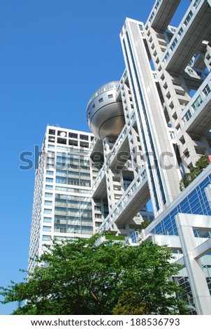 TOKYO - JUNE 1, 2010:  The futurist headquarters of Fuji Television. Completed in 1997, the unique architecture of this building is one of Odaiba island\'s famous landmarks.