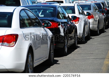 DENVER, CO, USA - JUNE 10, 2013: Cars in a parking lot at Denver airport. In 2013, Denver was the 5th busiest airport in the US and the 15th in the world with more than 52 million passengers.