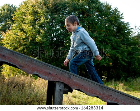 Boy walks up the stairs