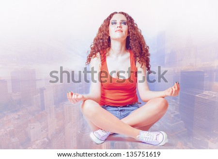 young woman do yoga meditation against blurred cityscape her eyes closed cross process toned