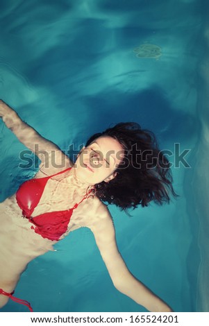 Young in Red Bikini  Woman In Basin