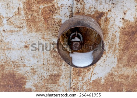 Rusty metal door with protected lock, place for copyspace