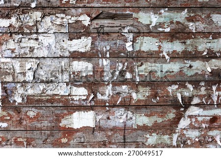 Stained dirty wood planks scratched background. Weathered wood planks is for you design. Obsolete rough backdrop with  spots of white paint and brown bare wood