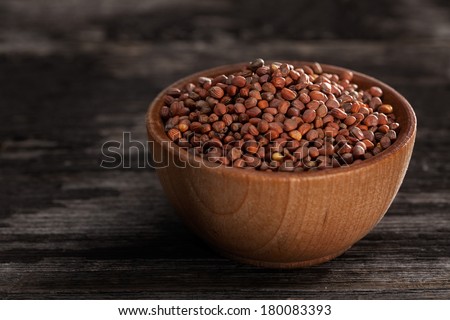 Close-up of Radish Sprouting Seeds in a Wooden bowl