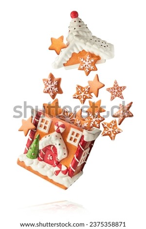 Similar – Image, Stock Photo Gingerbread cookies isolated on a blue background. Christmas homemade cookies top view