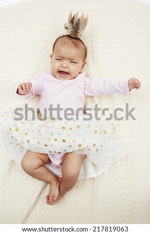 Six month old princess crying in studio