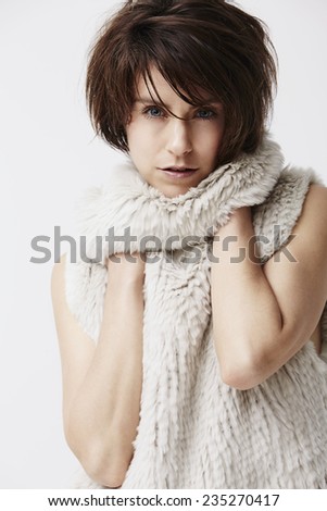 Portrait of woman in soft clothing, studio shot