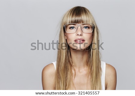 Similar – Image, Stock Photo blonde woman in front of a brick wall II