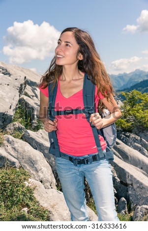 Woman looking to landscape during hiking