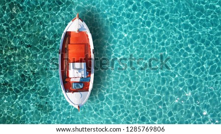 Similar – Image, Stock Photo Mediterranean Greek landscape drone shot at Kavourotripes beach with bathers. Sithonia Chalkidiki peninsula aerial top view with rocky coastal, crystal clear waters & sea beds with umbrellas.