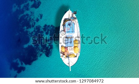 Similar – Image, Stock Photo Mediterranean Greek landscape drone shot at Kavourotripes beach with bathers. Sithonia Chalkidiki peninsula aerial top view with rocky coastal, crystal clear waters & sea beds with umbrellas.