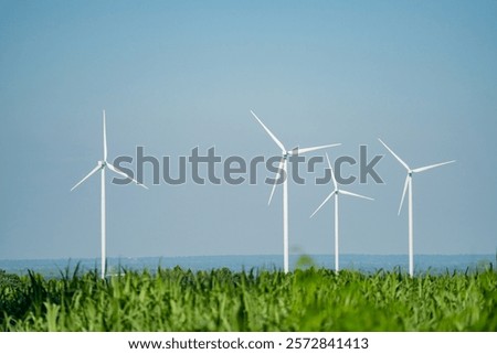 Similar – Image, Stock Photo Wind turbine with rising sun