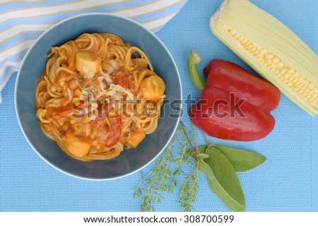 Corn Bell Pepper Tomato Spaghetti Pasta cooked in Tomato Sauce and Herbs