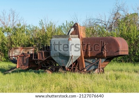 Similar – Image, Stock Photo scrapped and abandoned combine harvester in the middle of a corn field, under a circumpolar of stars on a clear night, long exposure night photography