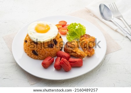 Similar – Image, Stock Photo Fried eggs with tomatoes and broccoli in white frying pan on kitchen table with ingredients. Top view. Healthy breakfast