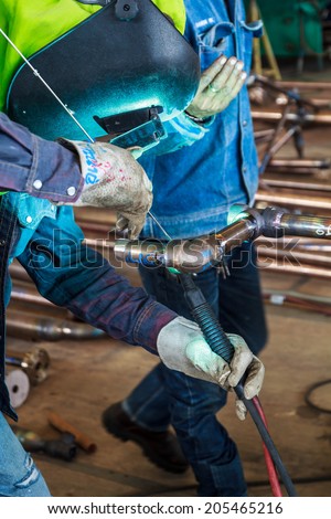 Welding sparks of welders in the industry.