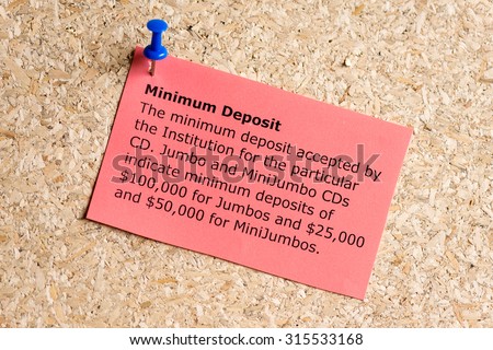 minimum deposit word typed on a paper and pinned to a cork notice board