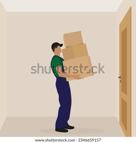 A loader with boxes in his hands standing in front of a closed door