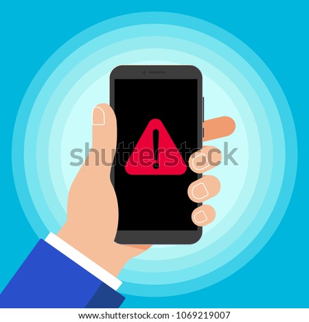 Hand holding black mobile phone with warning notice symbol icon sign on the screen isolated on background. Smartphone in human hand vector illustration flat design style. Attention, please!