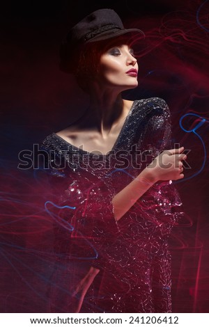 Mixed light fashion portrait of young woman.