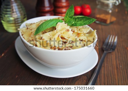 Pasta with pesto sauce with fresh basil