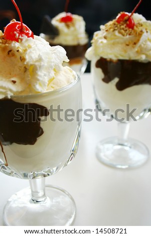 Three delicious hot chocolate fudge sundae