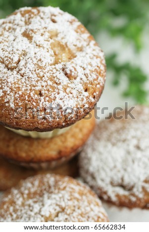 Fresh muffins with sugar powder on top
