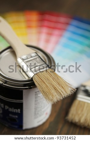 Brush on a little bucket with a color guide in background
