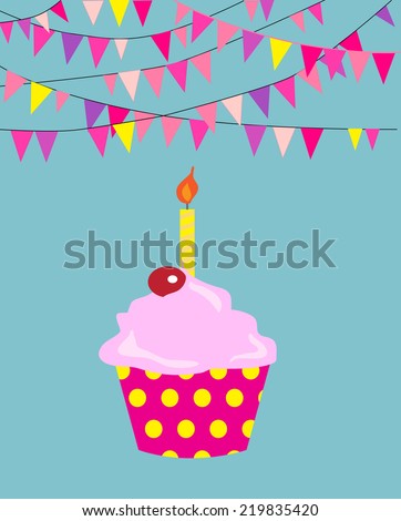Birthday cupcake with candle with flags banner.