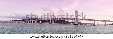 MACAU, CHINA - MAY 25 2014:  Sai Van Bridge is a cable-stayed bridge in Macau inaugurated on December 19, 2004. The bridge is the third one to cross the Praia Grande Bay connecting Taipa Island.