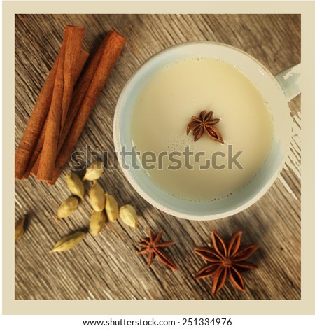 Chai tea with cinnamon, anise and cardamom.  Instagram style picture.  Cross processed to look like and instant picture.