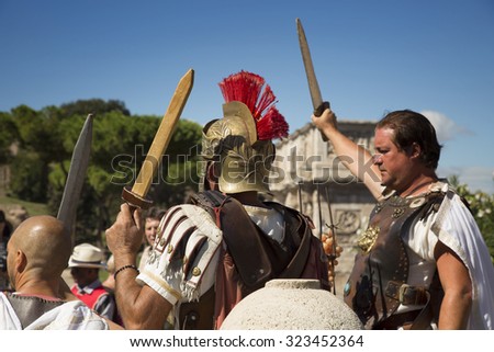ROME, ITALY-SEPT 25, 2015: Performers wearing a gladiator costume in touristic place in Rome, Italy