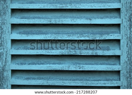 Close up of Blue Shutters in a small French Village. Background / Texture