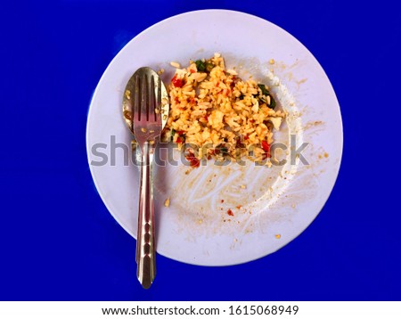 left over food on the plate with blue background ストックフォト © 