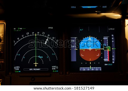 Light from a plane control  room in the dark.