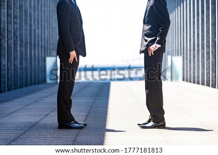 The feet of businessmen facing each other ストックフォト © 